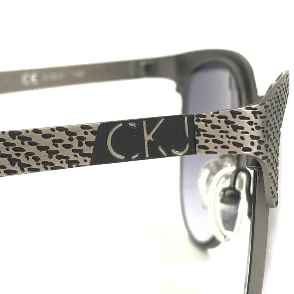Calvin Klein Jeans Sunglasses CKJ114S 006 Gray Round Frames with Purple Lenses